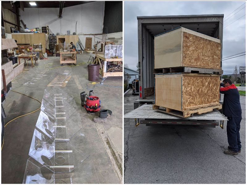 A shop and boxes being loaded into a truck.